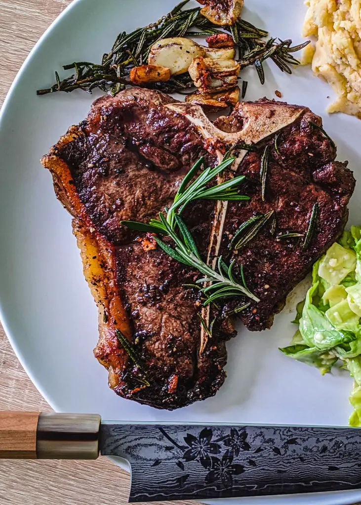 T-Bone Steak With Smashed Garlic And Rosemary Butter