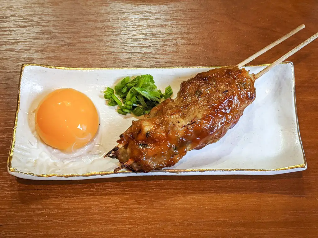 Tsukune (Japanese Chicken Meatballs) | つくね with raw egg yolk and chopped green onion