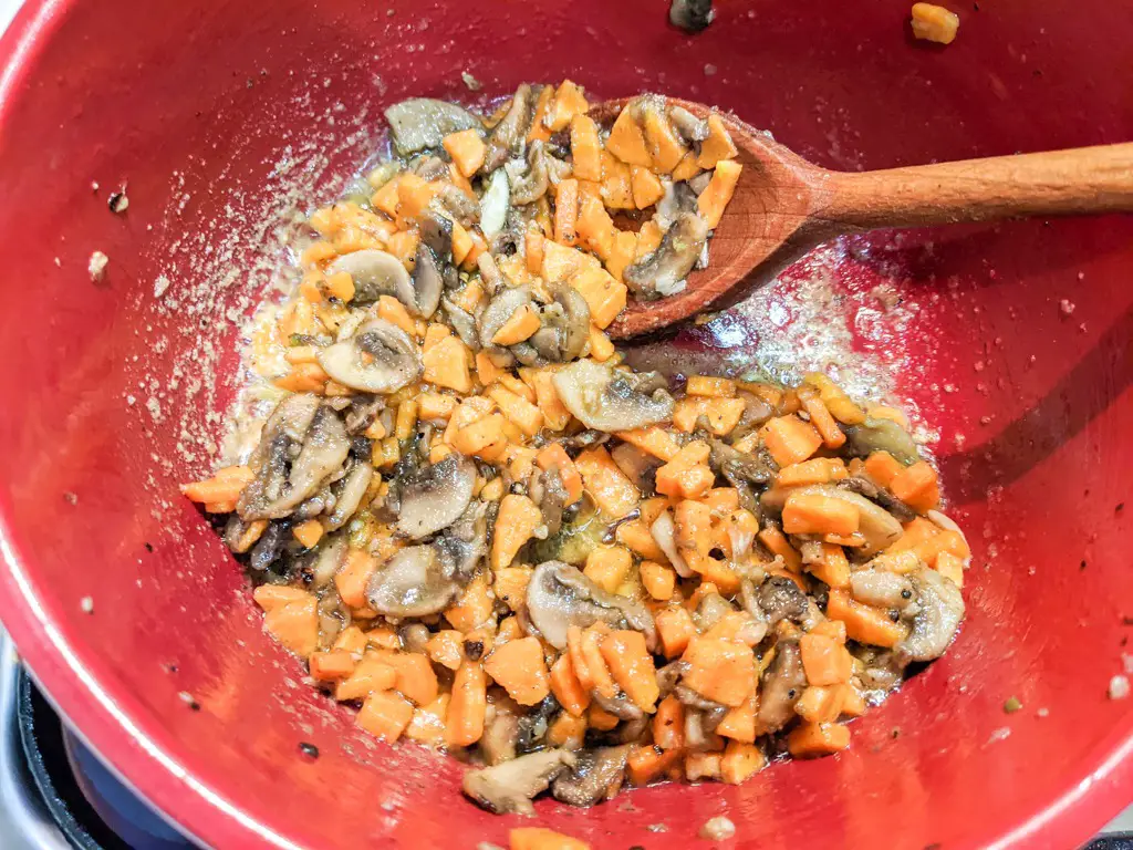 sauteeing mushrooms and carrots