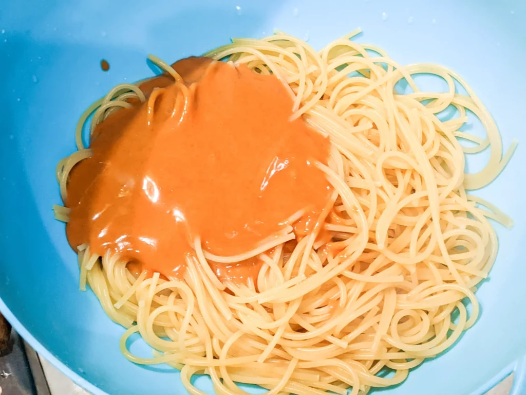 spicy cashew sauce on fresh noodles