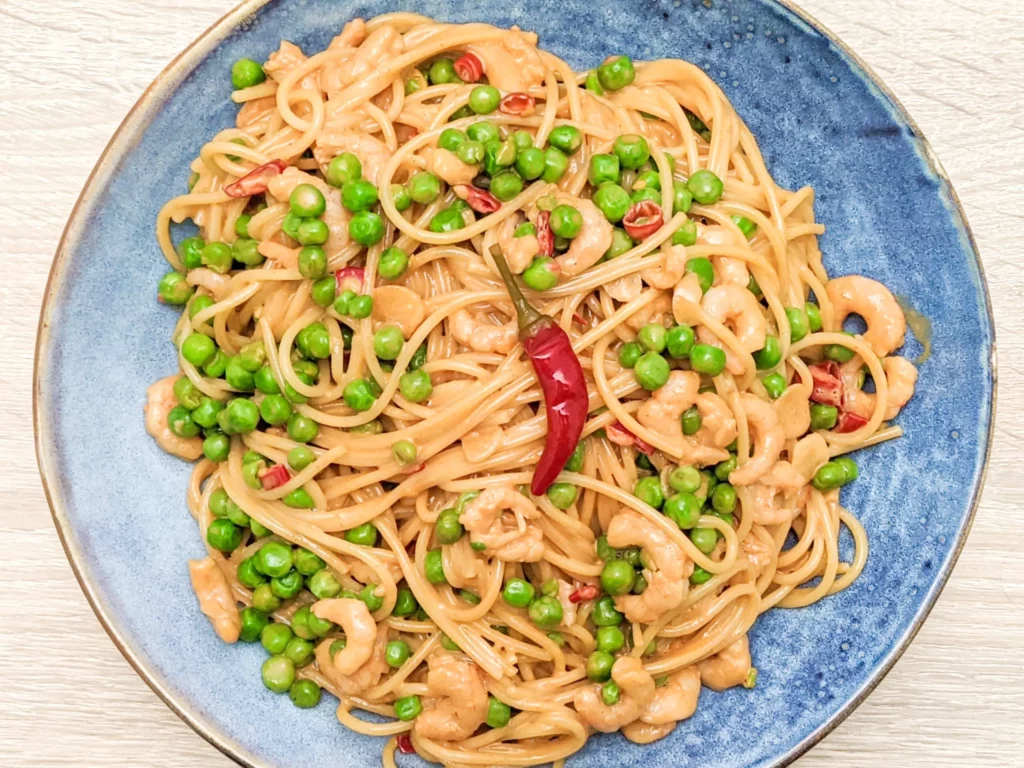 Spicy Cashew Sauce Noodles With Shrimp And Peas